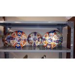 A set of 3 Chinese Imari pattern plates and 2 bowls