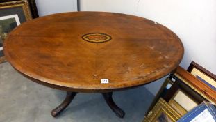 A Victorian oval inlaid mahogany tip up tea table COLLECT ONLY
