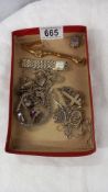 A mixed lot of white metal jewellery/charms including some silver and ladies wristwatches