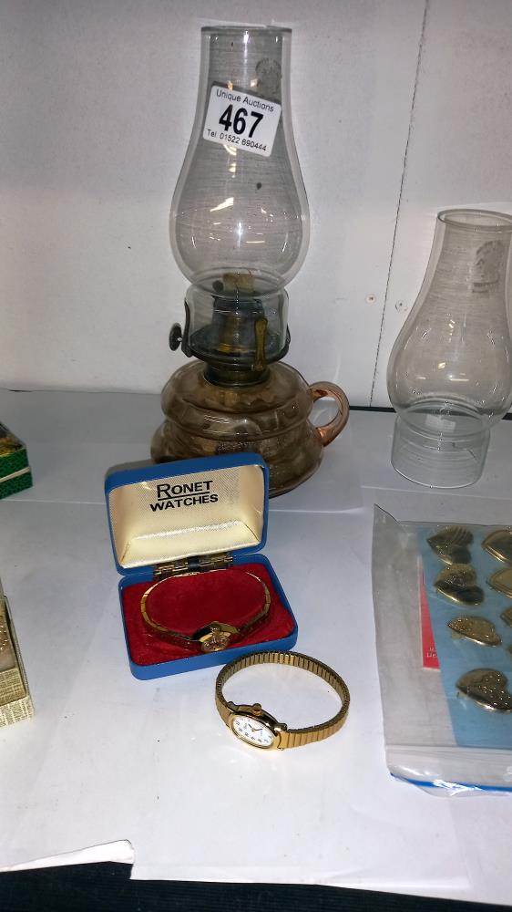 A mixed lot including oil lamp with chimneys, boxed harmonica, watches, RAF tie pin etc - Image 3 of 4