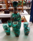 A silver overlaid blue glass decanter and 6 shot glasses drink set