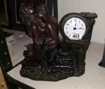 A bronzed resin classical themed mantle clock