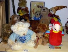 A quantity of soft toys including meerkats etc