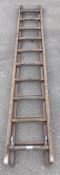 A vintage double extension wooden ladder COLLECT ONLY