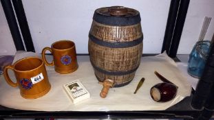 A vintage stoneware barrel, large pottery pipe, 2 Manikin cigar tankards etc