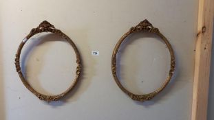2 oval ornate picture frames