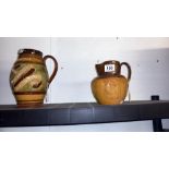A Doulton Lambeth Gladstone commemorative jug and a Doulton Stoneware George V coronation jug, (chip