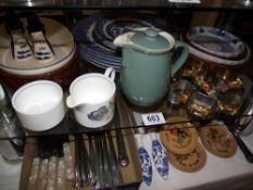 A quantity of kitchenalia including blue and white places, cutlery, napkin rings etc