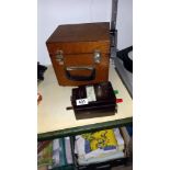 A Record minor insulation tester in a bakelite case and a insulation tester megger type IT5