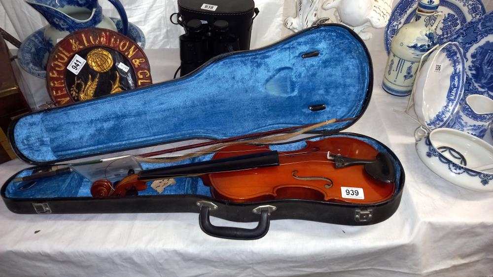 A copy of a Stradivarius violin in case