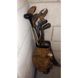 A quantity of vintage golf clubs in bag COLLECT ONLY