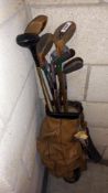 A quantity of vintage golf clubs in bag COLLECT ONLY