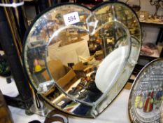 A heart shaped decorative Gypsy mirror COLLECT ONLY