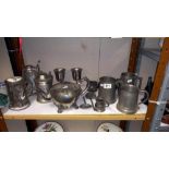 A quantity of pewter tankards, teapot, beer stein etc