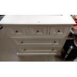 A white 5 drawer chest of drawers