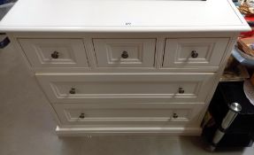 A white 5 drawer chest of drawers