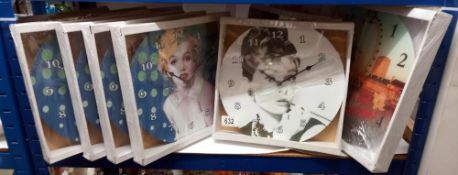 A quantity of new clocks including London, Marilyn Monroe, Audrey Hepburn