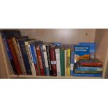 A shelf of mainly travel related books