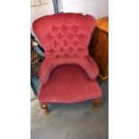 A pink Draylon deep buttoned nursing chair COLLECT ONLY