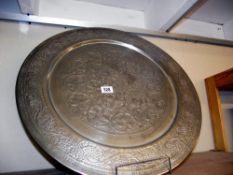 A large silver plated charger wall plate. Diameter approx 50cm COLLECT ONLY