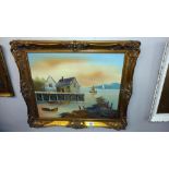 A gilt framed painting on board of sailing boats on water next to boat house COLLECT ONLY