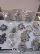 Fifteen large police badges for various constabularys.