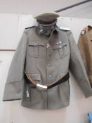 An East German officer uniform comprising trousers/jodphurs waist 34, custom tunic (large or medium)