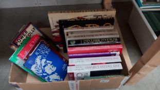 A box of books on Romans including The twelve Caesers, Roman emperors and Roman coins etc