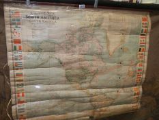 A large wall map of North and South America 102 x 95 cm, in distressed state.
