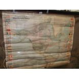 A large wall map of North and South America 102 x 95 cm, in distressed state.