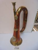 An Essex Regiment brass and copper bugle.