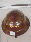 A WWII Players helmet.