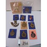 A mixed lot of badges including the Horse Guards, The Life Guards, 1st Kings Dragoons etc.,