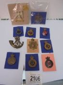 A mixed lot of badges including the Horse Guards, The Life Guards, 1st Kings Dragoons etc.,