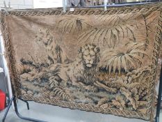 An old tapestry featuring a lion, 177 x 118 cm.