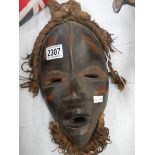 A Tribal face mask.