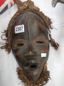 A Tribal face mask.