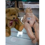 A vintage composition doll, 52cm and a teddy bear 31 cm.