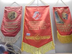 Three Russian silk banners.