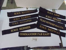 A quantity of Royal Navy cap bands.