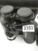 A good cased set of Bresser binoculars.