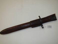 A Ross Rifle Co., Quebec patented 1907 bayonet with leather scabbard.