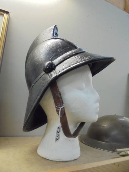 A late Victorian firemans helmet.