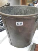 An early copper fireman's bucket.