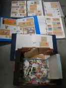 Five albums of stamps and a box of loose stamps.