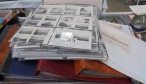 A large collection of approximately 1000 battleship & submarine related postcards in albums & loose.