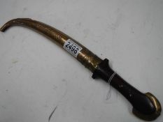 A 19/20th century Turkish? dagger with brass scabbard.