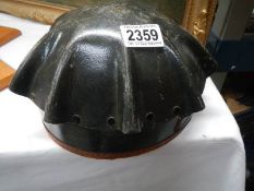 A 1930's Soviet era miner's helmet.