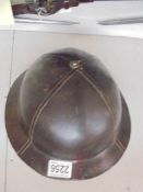 A WWII artillery helmet - Johahlihkgea NG494.