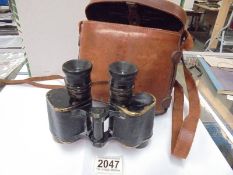 A cased set of Hunsicher & Alexis Paris military binoculars.